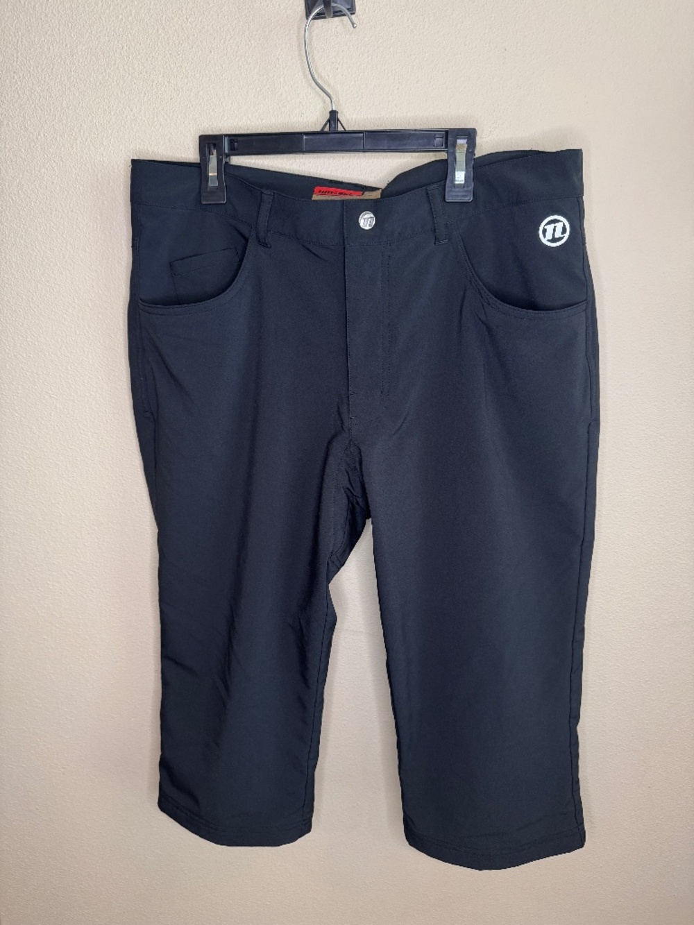 Novara Black Men's Pants. Cropped. Size 34.  Padded seat.